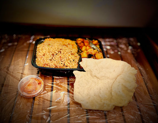 Tomato rice + potato poriyal + appalam + Pickle