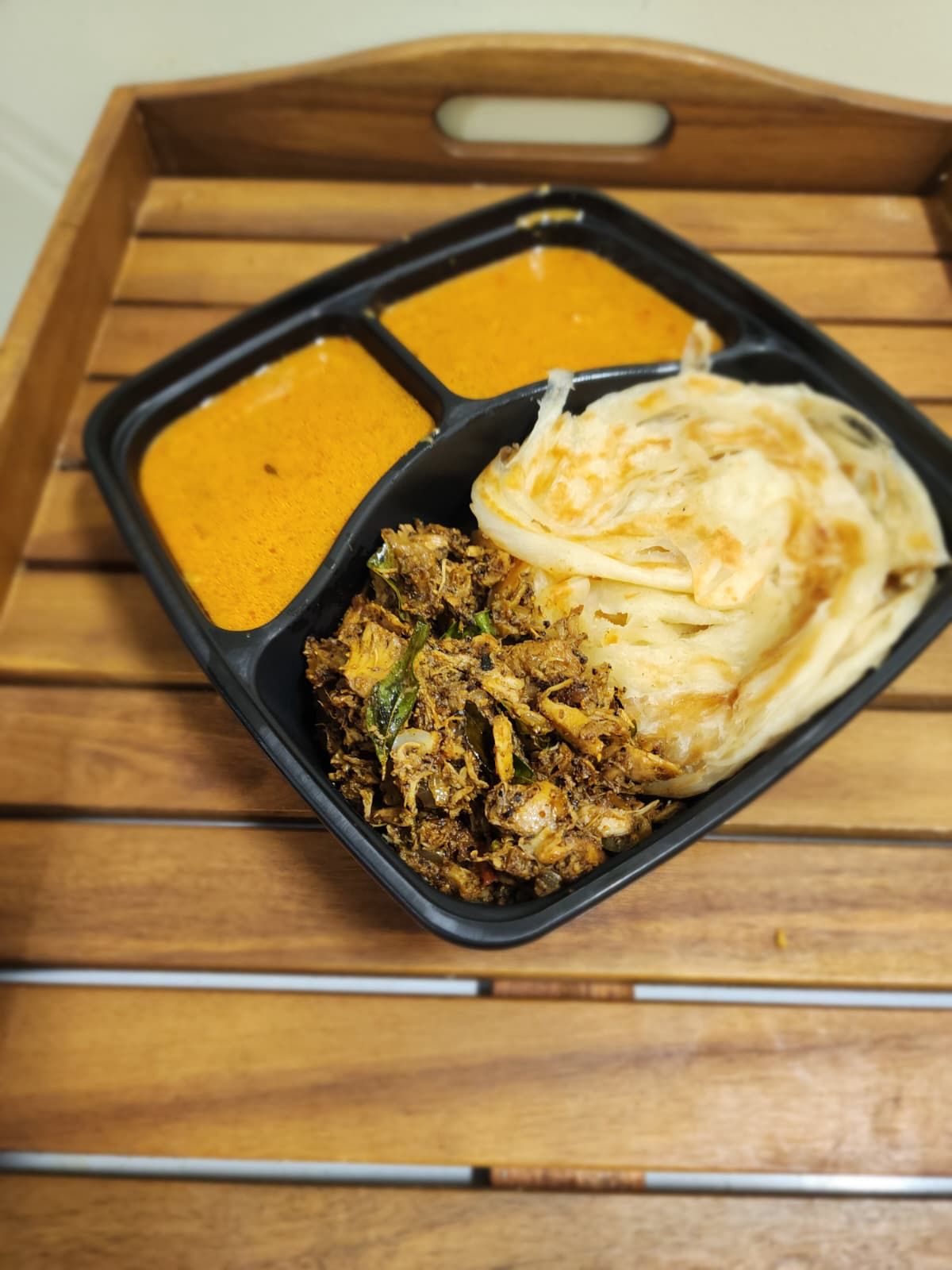 Porotta with Pichi Potta Chicken & salna